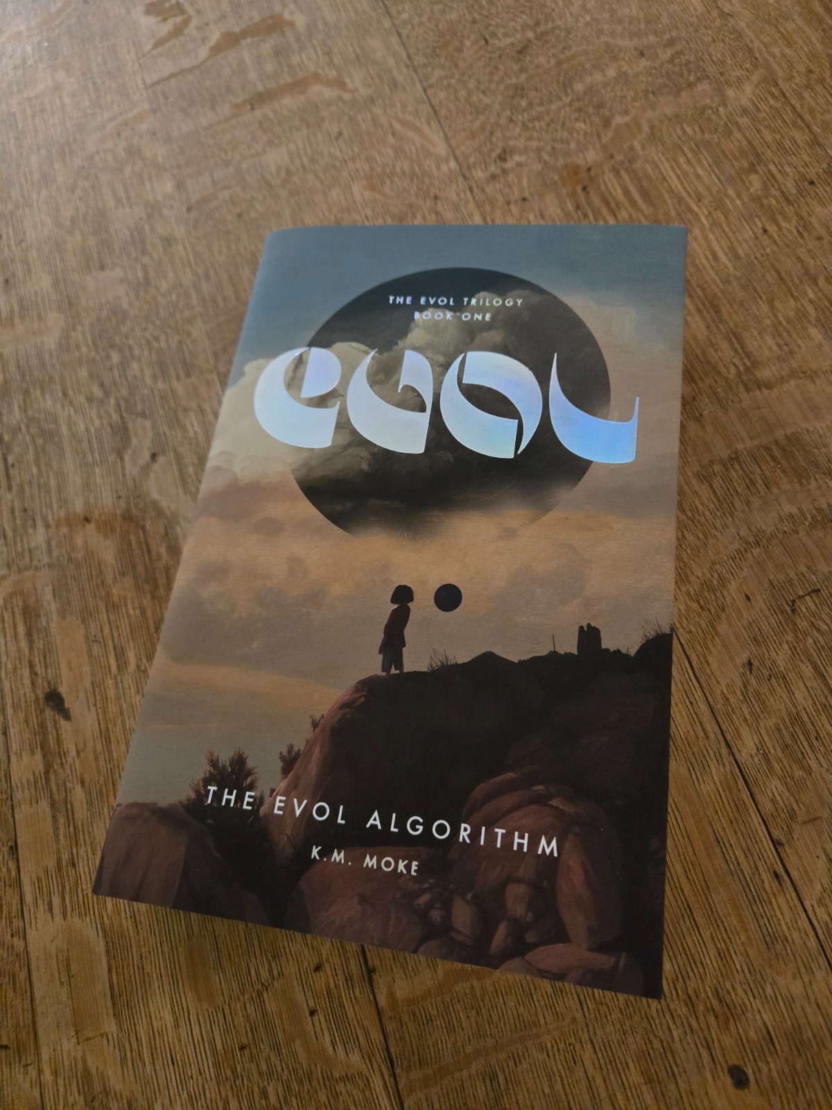 RARE/MINT: The EVOL Algorithm by K.M. Moke – Worldbuilders Triple Signed 150/200