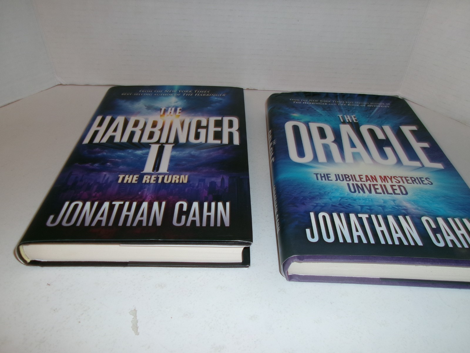 4 books by Jonathan Cahn, The Oracle, The Paradigm, the Harbinger II