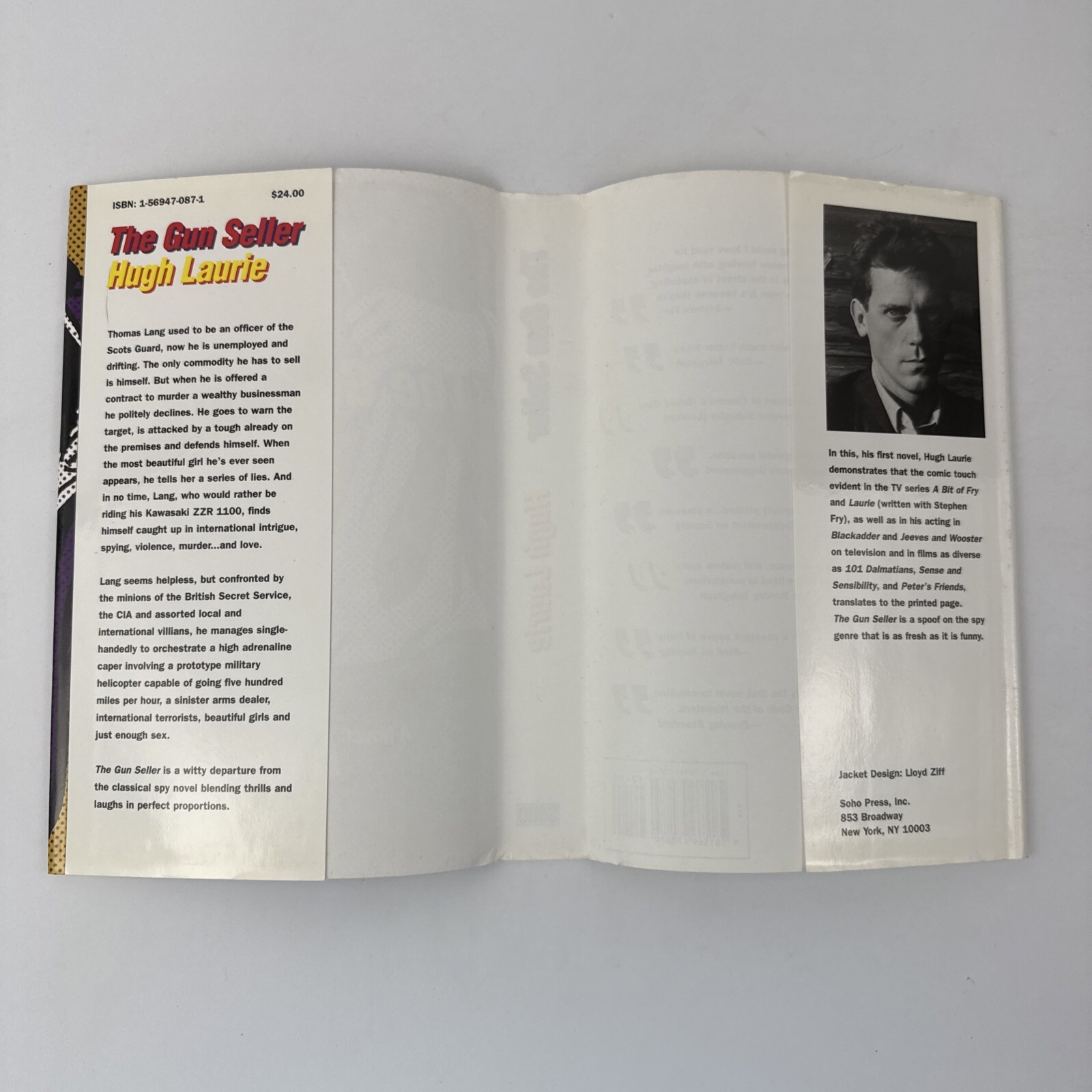 The Gun Seller by Hugh Laurie (1997, HCDJ) SOHO 1st US Edition, 1st Printing