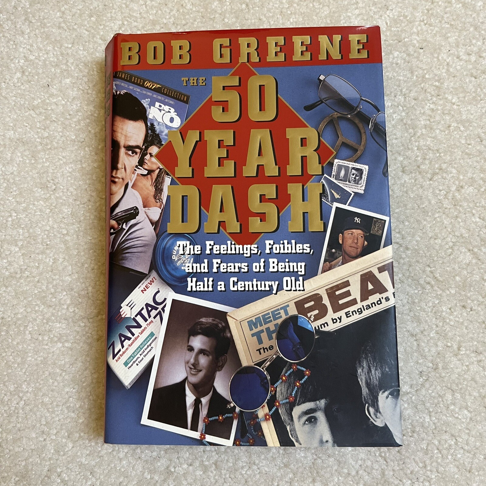 The 50 Year Dash: The Feelings, Foibles and Fears of Being a Half Century Old Hc