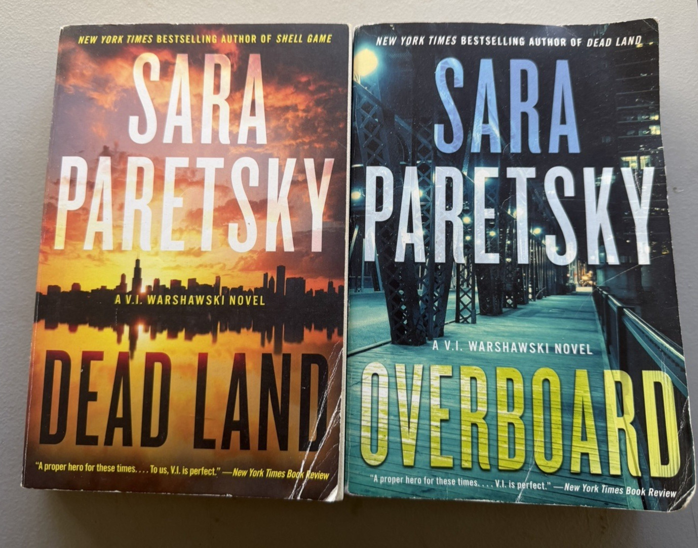 Lot of 2 Sara Paretsky Paperback Books- Overboard-Dead Land